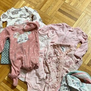 Set of Newborn Girl clothes and bibs including Carters, Burt’s bees baby, Gerber
